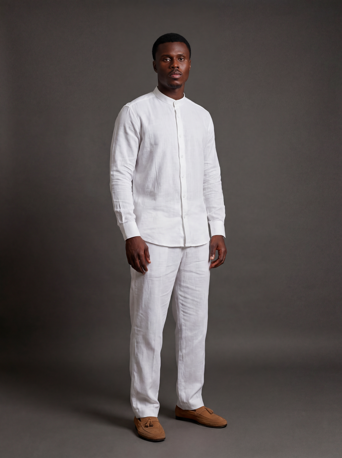 Orí Adé white mandarin-collar linen shirt and matching drawstring trousers — studio view