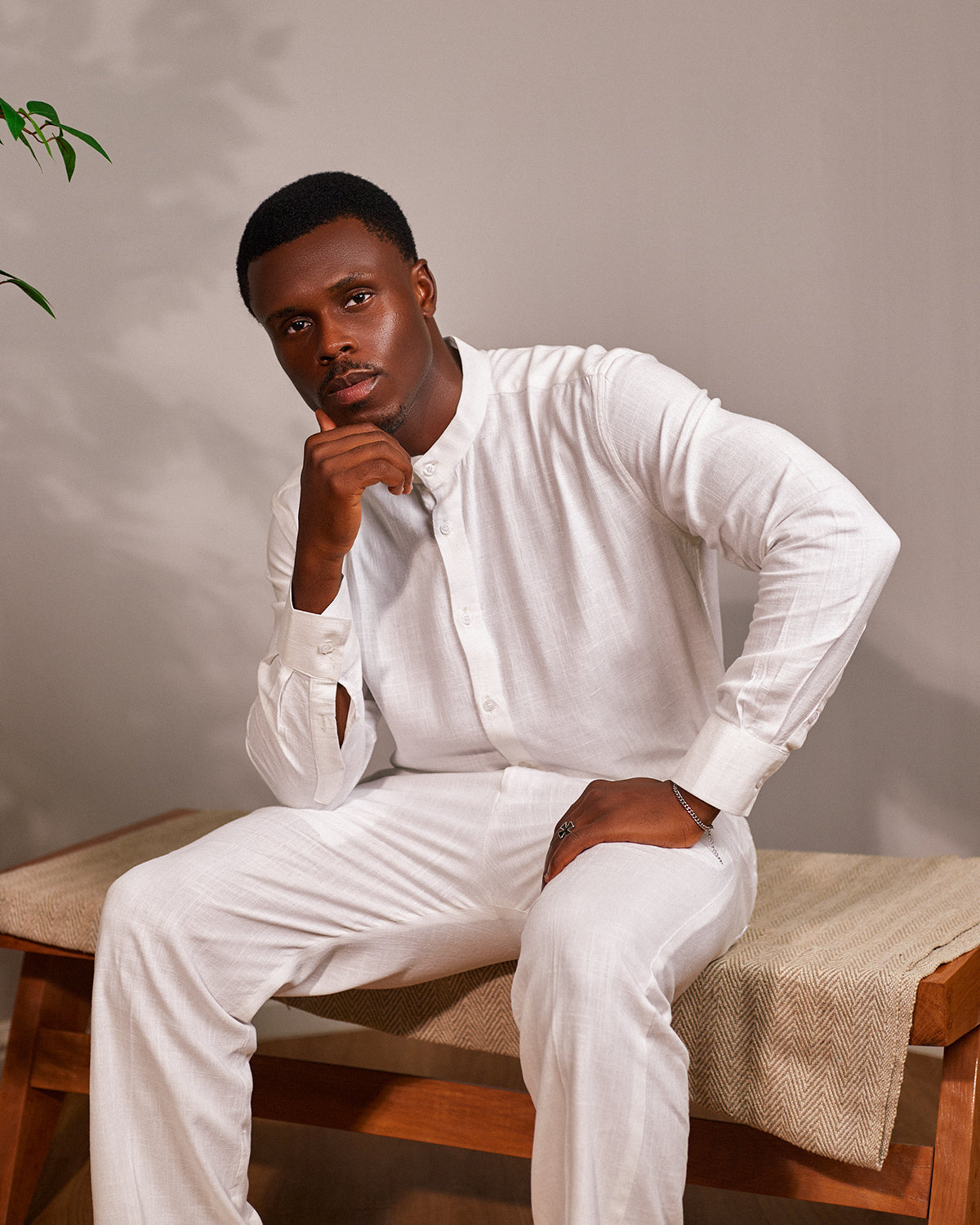 Orí Adé white mandarin-collar linen shirt and matching drawstring trousers — front view